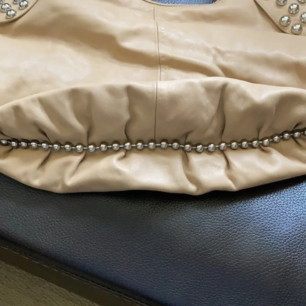 G series camel faux leather hobo purse with large silver decorative studs